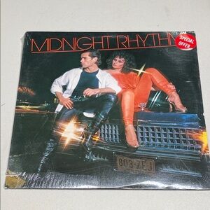 self-titled 1978 vinyl record album by the disco group Midnight Rhythm.  new